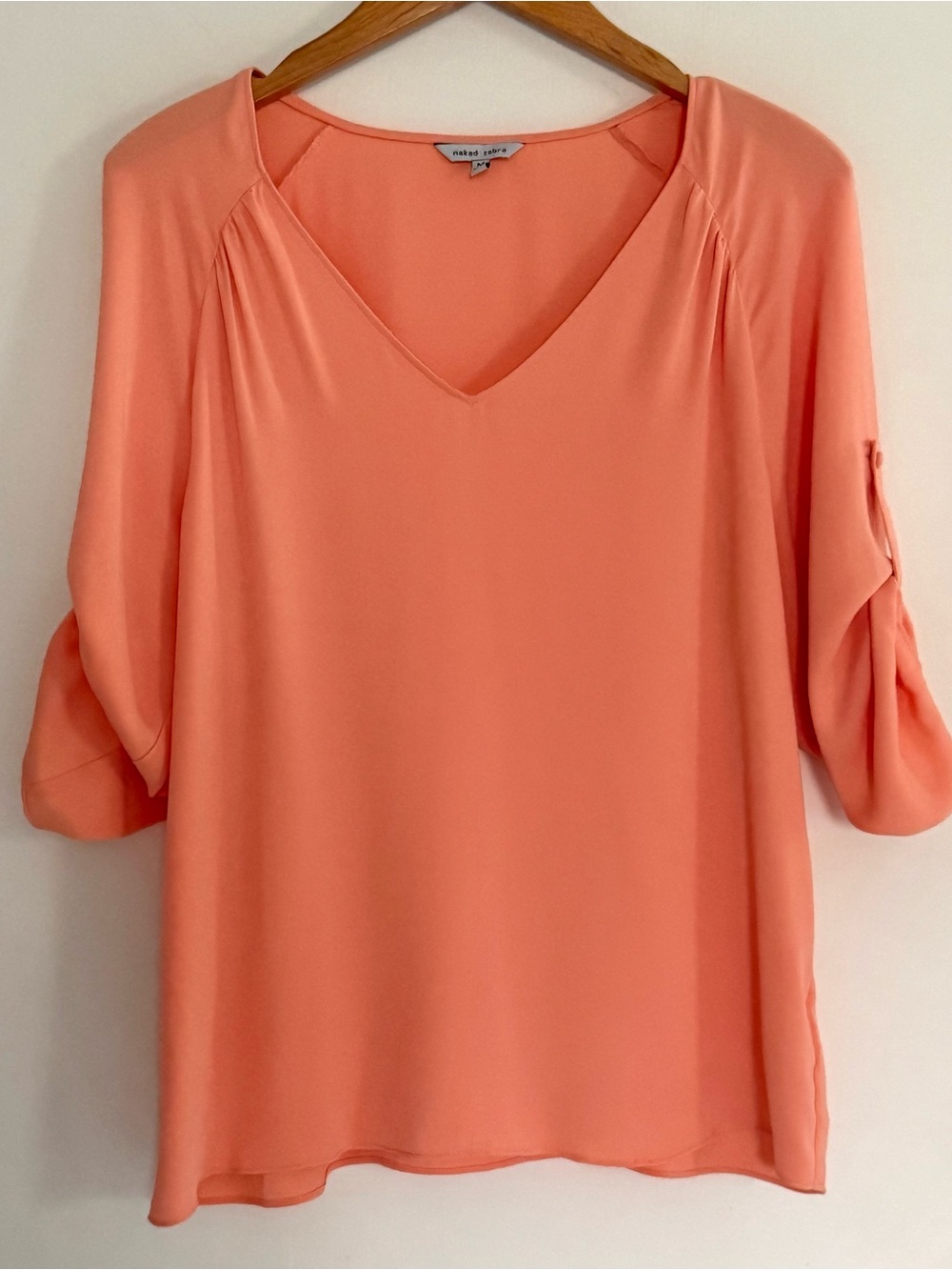 Naked Zebra Coral V-Neck Roll-Tab Sleeve Blouse